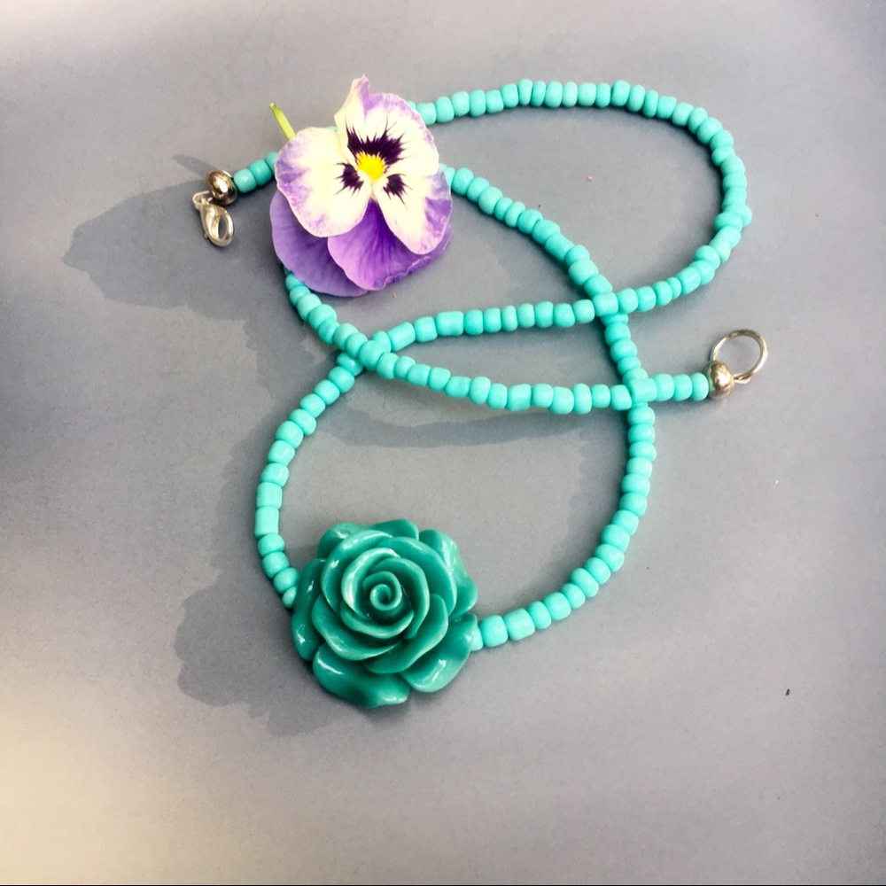 Teal blue flower.necklace